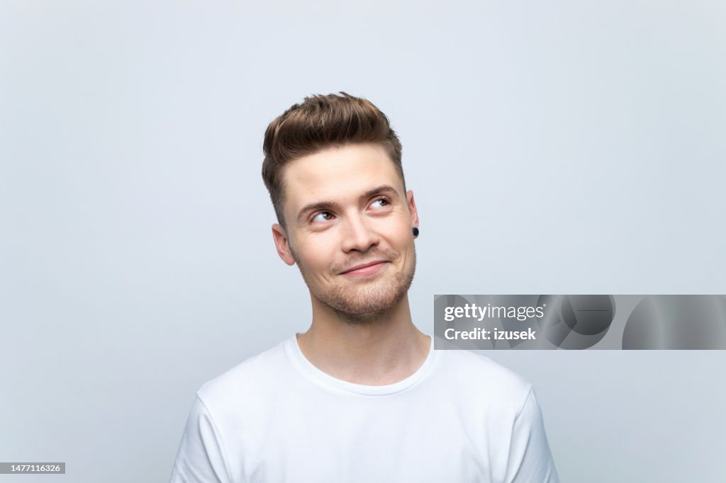 Young man looking up