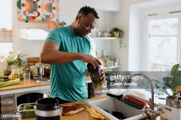 post-workout refreshment - healthy eating man stock pictures, royalty-free photos & images