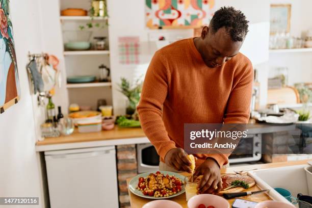 man preparing healthy homemade meal - cooking chickpeas stock pictures, royalty-free photos & images