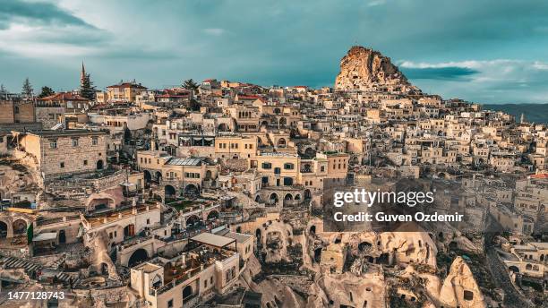 aerial view of uchisar, aerial view of cappadocia, uçhisar castle, famous place of turkey, natural formation fairy chimneys, unesco heritage destination, aerial view of cappadocia, historical region in central anatolia, old settlement, village of stone - capadócia imagens e fotografias de stock
