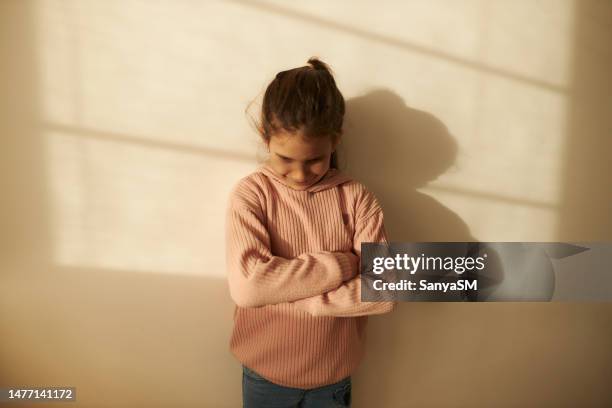 portrait of sad girl - avoid conflict stock pictures, royalty-free photos & images