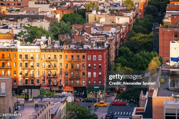 aerial view of street with residential apartment buildings on a summer day, new york, usa - greenwich village photos et images de collection