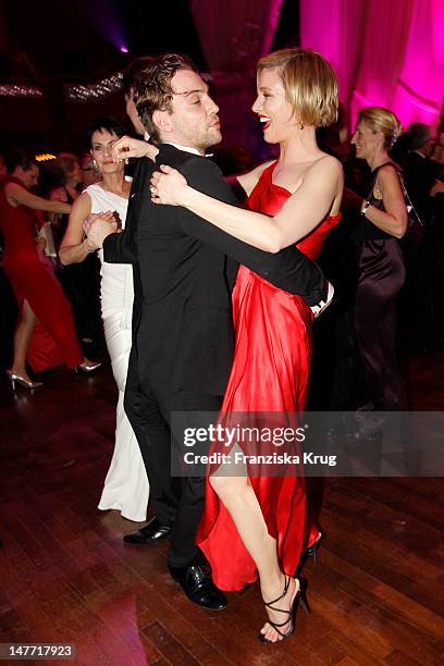 Julia Stinshoff and Leander Licht attend the German Opera Ball 2012 at the Alte Oper on February 25, 2012 in Frankfurt, Germany.