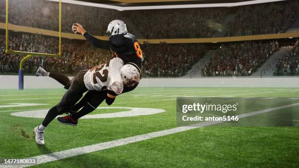 dos jugadores de fútbol americano con uniforme deportivo y equipo de protección en movimiento, acción en la arena del estadio deportivo modelo 3d - futbol americano fotografías e imágenes de stock