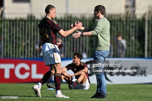 Derry Scherhant of Germany U20 shankes hands with Hannes Wolf head coach of Germany U20 during the U20 international friendly match between Italy and...