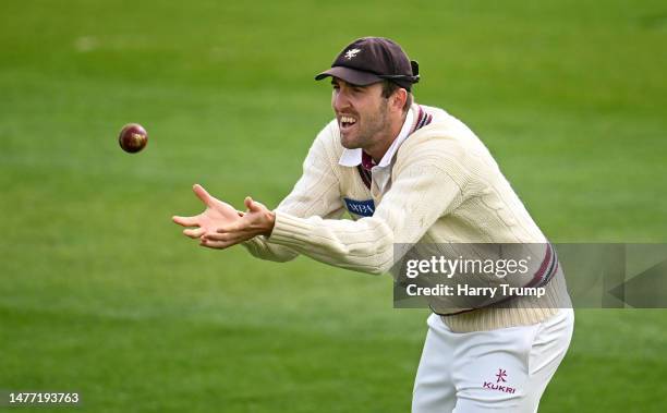 Craig Overton of Somerset gathers the ball during the Pre-season Friendly match between Somerset and Glamorgan at The Cooper Associates County Ground...