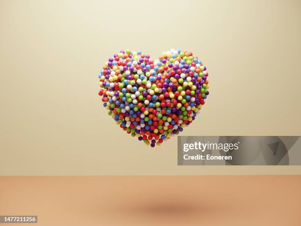 herzsymbol mit mehrfarbigen kugeln - danke stock-fotos und bilder