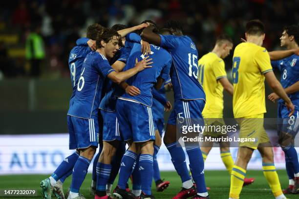 Players of Italy celebrate during the International Friendly match between Italy U21 and Ukraine U21 at Stadio Oreste Granillo on March 27, 2023 in...