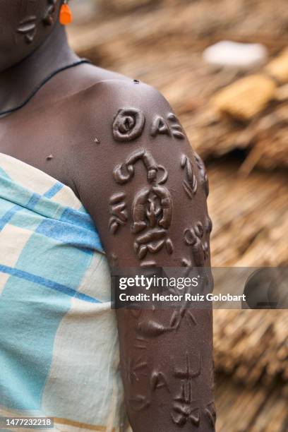 African Ritual Scarification 724 African Scarification Stock Photos, High-Res Pictures, and Images ...