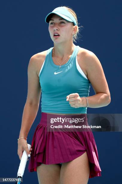 Anastasia Potapova of Russia celebrates while playing Qinwen Zheng of China during the Miami Open at Hard Rock Stadium on March 27, 2023 in Miami...