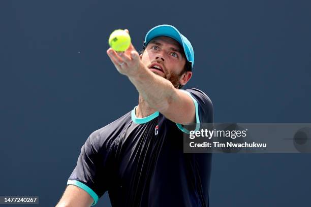 Quentin Halys of France serves to Mackenzie McDonald of the United States during the Miami Open at Hard Rock Stadium on March 27, 2023 in Miami...