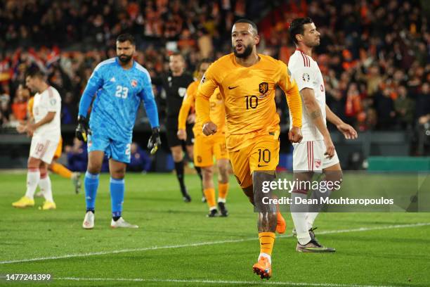 Memphis Depay of Netherlands celebrates after scoring the team's first goal during the UEFA EURO 2024 qualifying round group B match between...