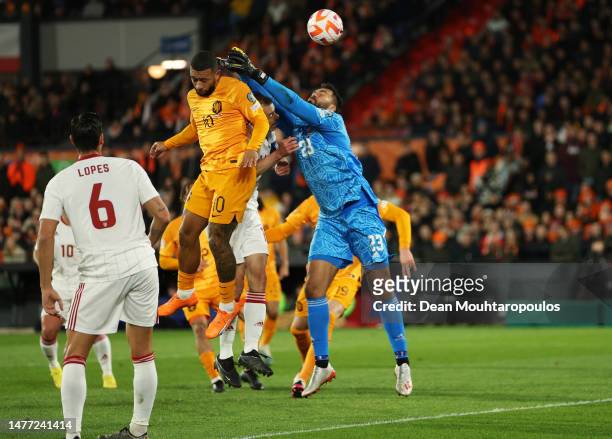Memphis Depay of Netherlands scores the team's first goal past Dayle Coleing of Gibraltar during the UEFA EURO 2024 qualifying round group B match...