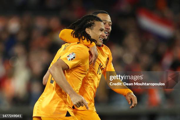 Nathan Ake of Netherlands celebrates after scoring the team's second goal during the UEFA EURO 2024 qualifying round group B match between...