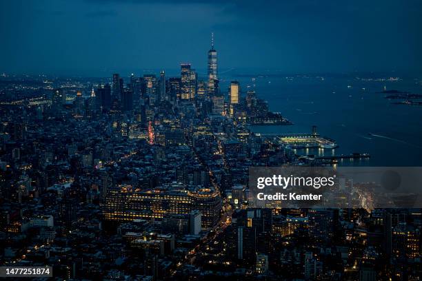 manhattan skyline at night - one-world-trade-center-aerial stock pictures, royalty-free photos & images