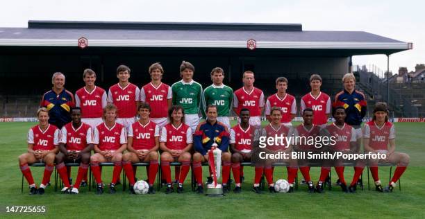 The Arsenal 1st team squad with the Littlewoods League Cup, at Highbury Stadium in London, August 1987. Back row : Theo Foley , Martin Hayes, Alan...