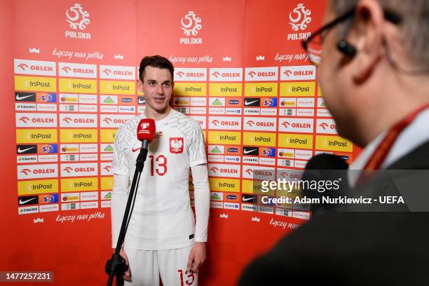 Jakub Kaminski of Poland speaks to the media after the UEFA EURO 2024 qualifying round group B match between Poland and Albania at National Stadium...