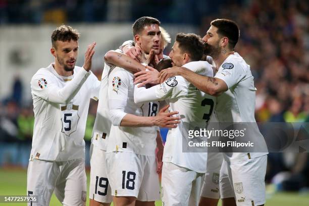 Dusan Vlahovic of Serbia celebrates after scoring the team's second goal with teammates during the UEFA EURO 2024 qualifying round group B match...
