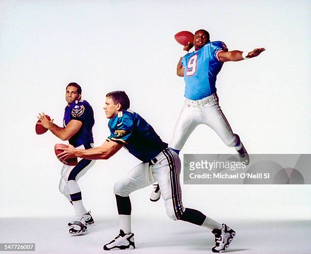 Quarterbacks Vinny Testaverde , Mark Brunell and Steve McNair are photographed for Sports Illustrated on July 3, 1997 in New York City. CREDIT MUST...