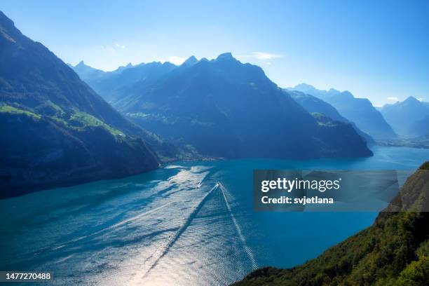 aerial view of two boats sailing on lake lucerne, switzerland - tranquil scene stock pictures, royalty-free photos & images