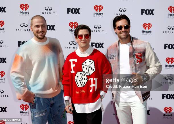 Kendall Schmidt, Logan Henderson and James Maslow of Big Time Rush attend the 2023 iHeartRadio Music Awards at Dolby Theatre on March 27, 2023 in...