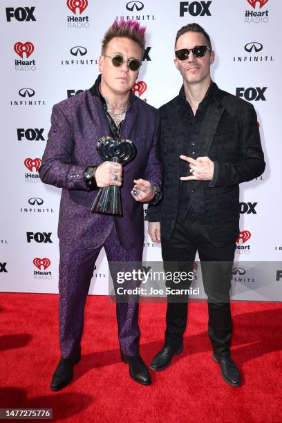 Jacoby Shaddix and Jerry Horton of Papa Roach attend the 2023 iHeartRadio Music Awards at Dolby Theatre in Los Angeles, California on March 27, 2023....