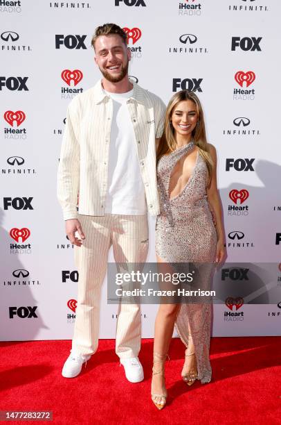 Harry Jowsey and Georgia Hassarati attend the 2023 iHeartRadio Music Awards at Dolby Theatre on March 27, 2023 in Hollywood, California.