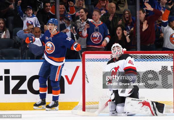 Pierre Engvall of the New York Islanders celebrates his first period goal against Vitek Vanecek of the New Jersey Devils at the UBS Arena on March...