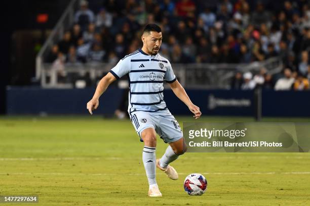 Roger Espinoza of Sporting Kansas City with the ball during a game between Seattle Sounders FC and Sporting Kansas City at Children's Mercy Park on...