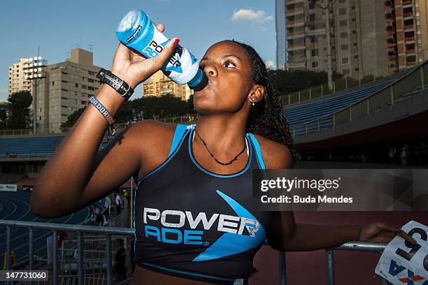 Brazilian Dandadeua Asteria de Souza, drinks from a bottle after the Womens 400 meters Event during the second day of the Trofeu Brazil/Caixa 2012...