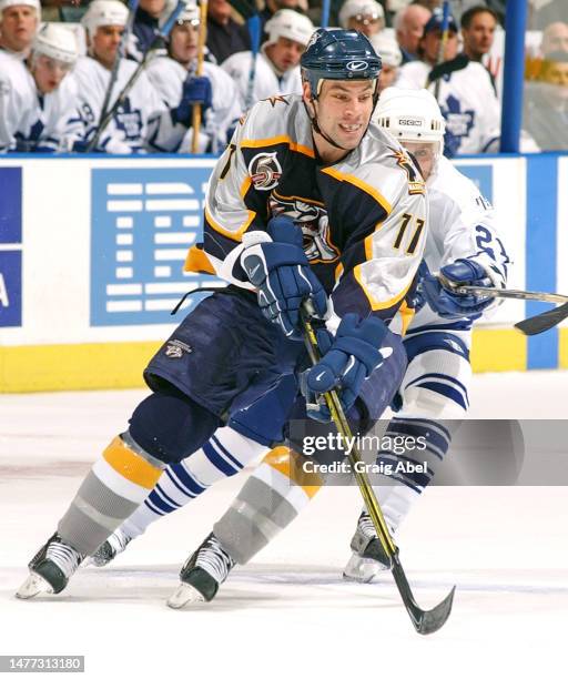 David Legwand of the Nashville Predators skates against the Toronto Maple Leafs during NHL game action on February 23, 2003 at Air Canada Centre in...