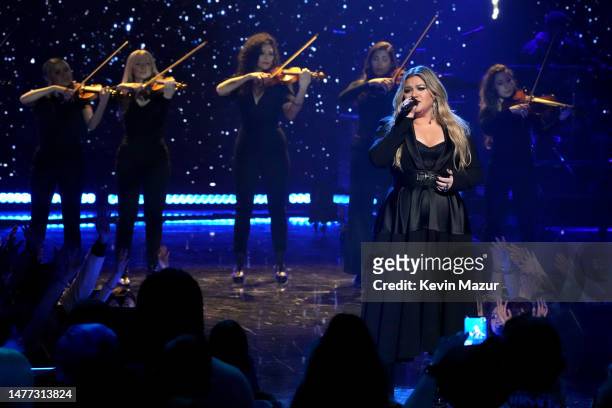 Kelly Clarkson performs onstage during the 2023 iHeartRadio Music Awards at Dolby Theatre in Los Angeles, California on March 27, 2023. Broadcasted...