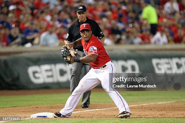 Adrian Beltre forces out the runner and 3rd and throws to 1st base to complete the double play of the Texas Rangers against the Detroit Tigers on...
