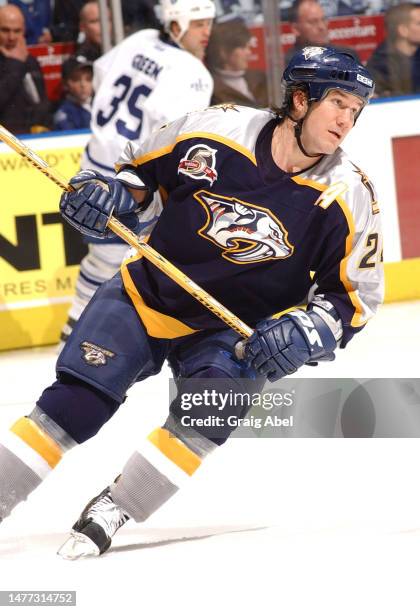 Scott Walker of the Nashville Predators skates against the Toronto Maple Leafs during NHL game action on February 23, 2003 at Air Canada Centre in...