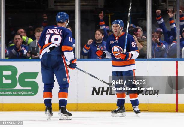 Kyle Palmieri of the New York Islanders celebrates his goal against the New Jersey Devils at 14:21 of the third period at the UBS Arena on March 27,...