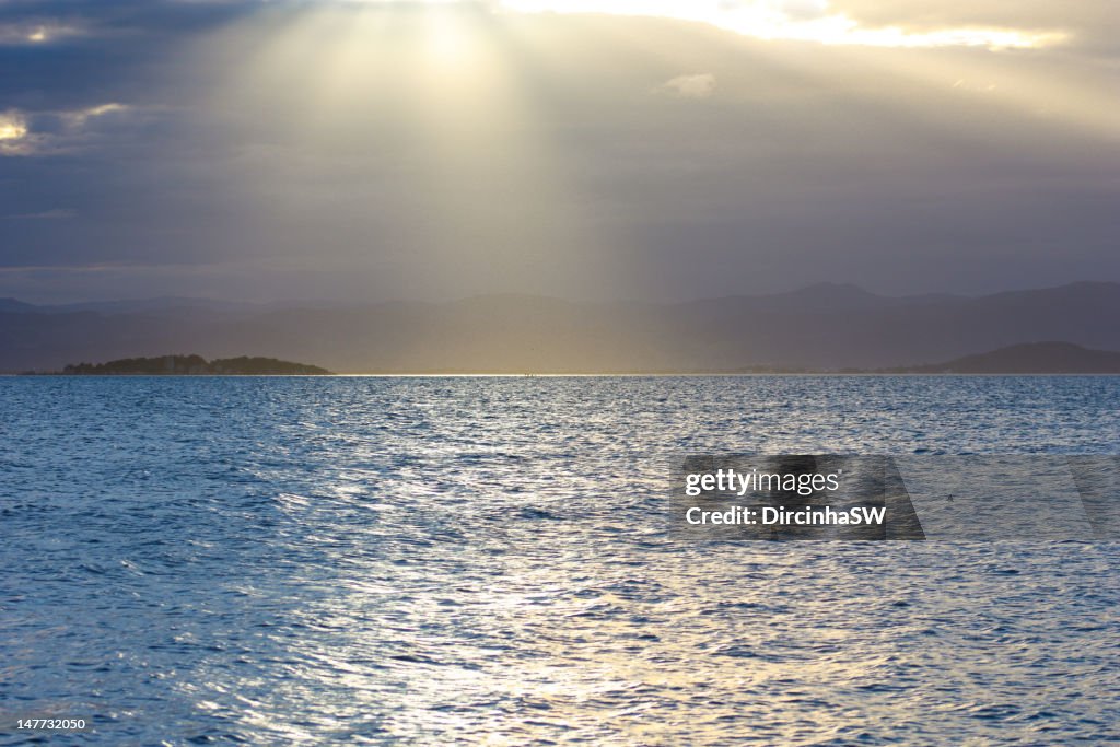 Sunbeam over sea