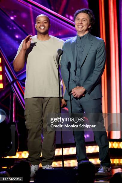Donald Faison and Zach Braff speak onstage during the 2023 iHeartRadio Music Awards at Dolby Theatre on March 27, 2023 in Hollywood, California.