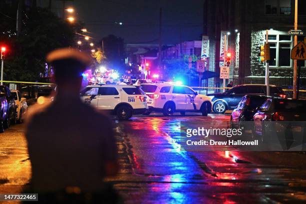 Police work the scene of a shooting on July 3, 2023 in Philadelphia, Pennsylvania. Early reports say the suspect is in custody after shooting 6...