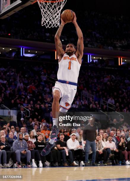 Obi Toppin of the New York Knicks dunks in the second half against the Houston Rockets at Madison Square Garden on March 27, 2023 in New York City....