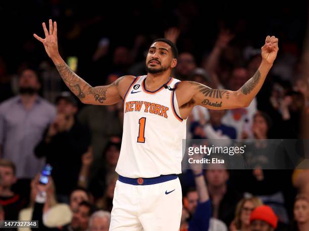 Obi Toppin of the New York Knicks celebrates last in the fourth quarter against the Houston Rockets at Madison Square Garden on March 27, 2023 in New...