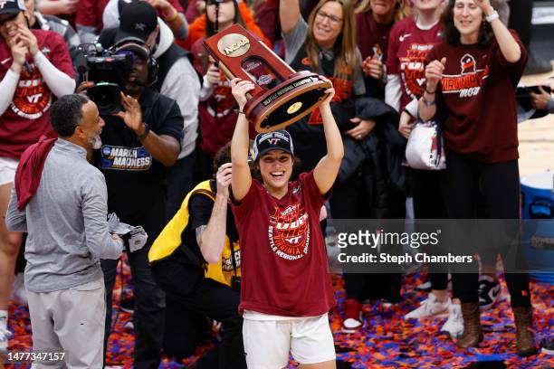 Georgia Amoore of the Virginia Tech Hokies celebrates after defeating the Ohio State Buckeyes 84-74 in the Elite Eight round of the NCAA Women's...