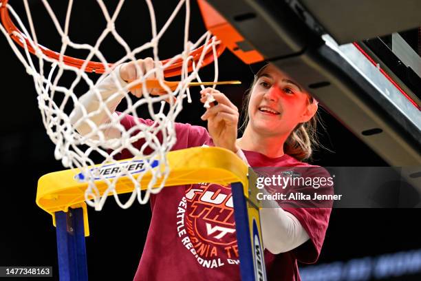 Elizabeth Kitley of the Virginia Tech Hokies celebrates after defeating the Ohio State Buckeyes 84-74 in the Elite Eight round of the NCAA Women's...