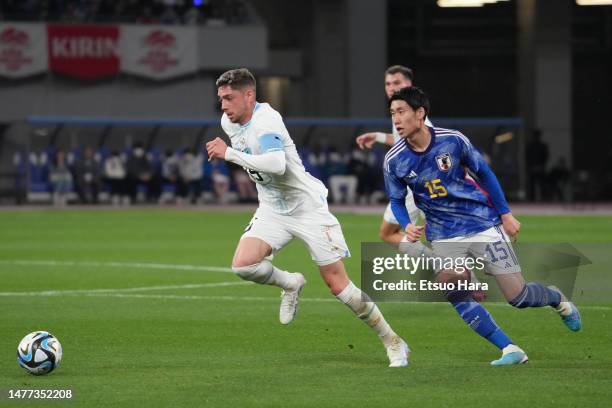 Federico Valverde of Uruguay in action under pressure from Daichi Kamada of Japan during the international friendly match between Japan and Uruguay...
