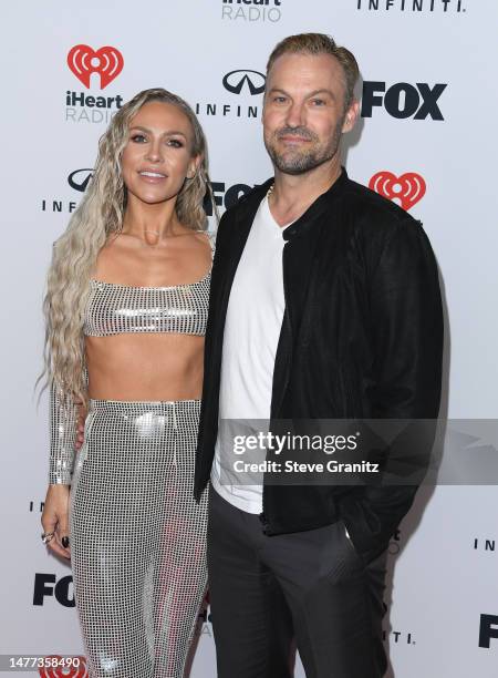 Sharna Burgess, Brian Austin Green poses at the 2023 iHeartRadio Music Awards - Press Room at Dolby Theatre on March 27, 2023 in Hollywood,...