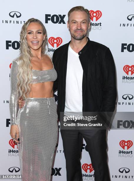 Sharna Burgess, Brian Austin Green poses at the 2023 iHeartRadio Music Awards - Press Room at Dolby Theatre on March 27, 2023 in Hollywood,...