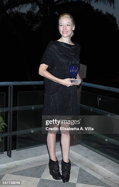 Actress Sarah Felberbaum shows her award during the 2012 Premio Afrodite at Casa del Cinema on July 2, 2012 in Rome, Italy.