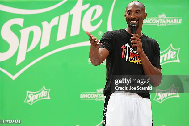 Kobe Bryant joins members of the Boys & Girls Club of Santa Barbara to unveil a newly refreshed basketball court at the facility in celebration of...