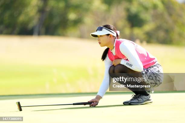 Fumie Tsune of Japan lines up a putt on the 17th green during the first round of rashink NINGINEER/RKB Ladies at the Classic Golf Club on March 28,...