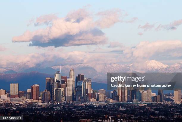 Downtown Los Angeles with Snowcapped Mountains on the Back