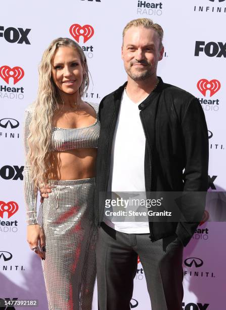 Sharna Burgess, Brian Austin Green arrives at the 2023 iHeartRadio Music Awards at Dolby Theatre on March 27, 2023 in Hollywood, California.